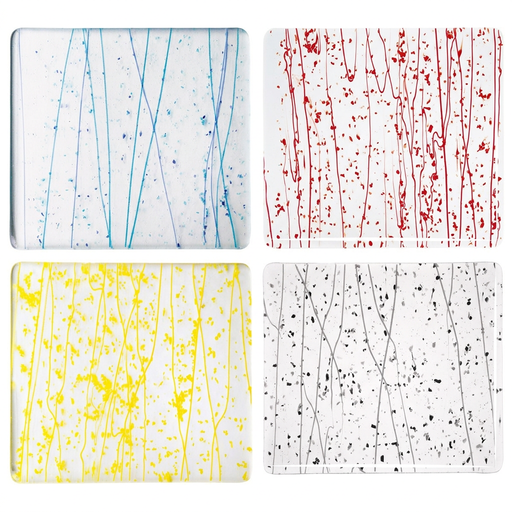 Four Bullseye collage glass Studio Squares with blue, red, yellow and grey-black frit and streamers