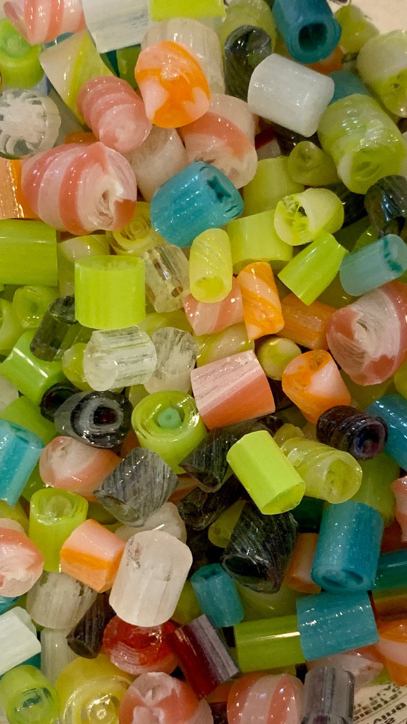 A close-up pile of glow glass murine